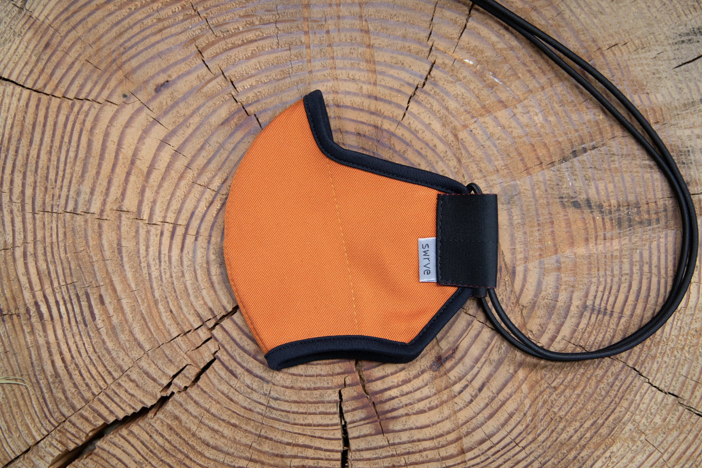 flat shot of the organic summer cotton mask in burnt orange