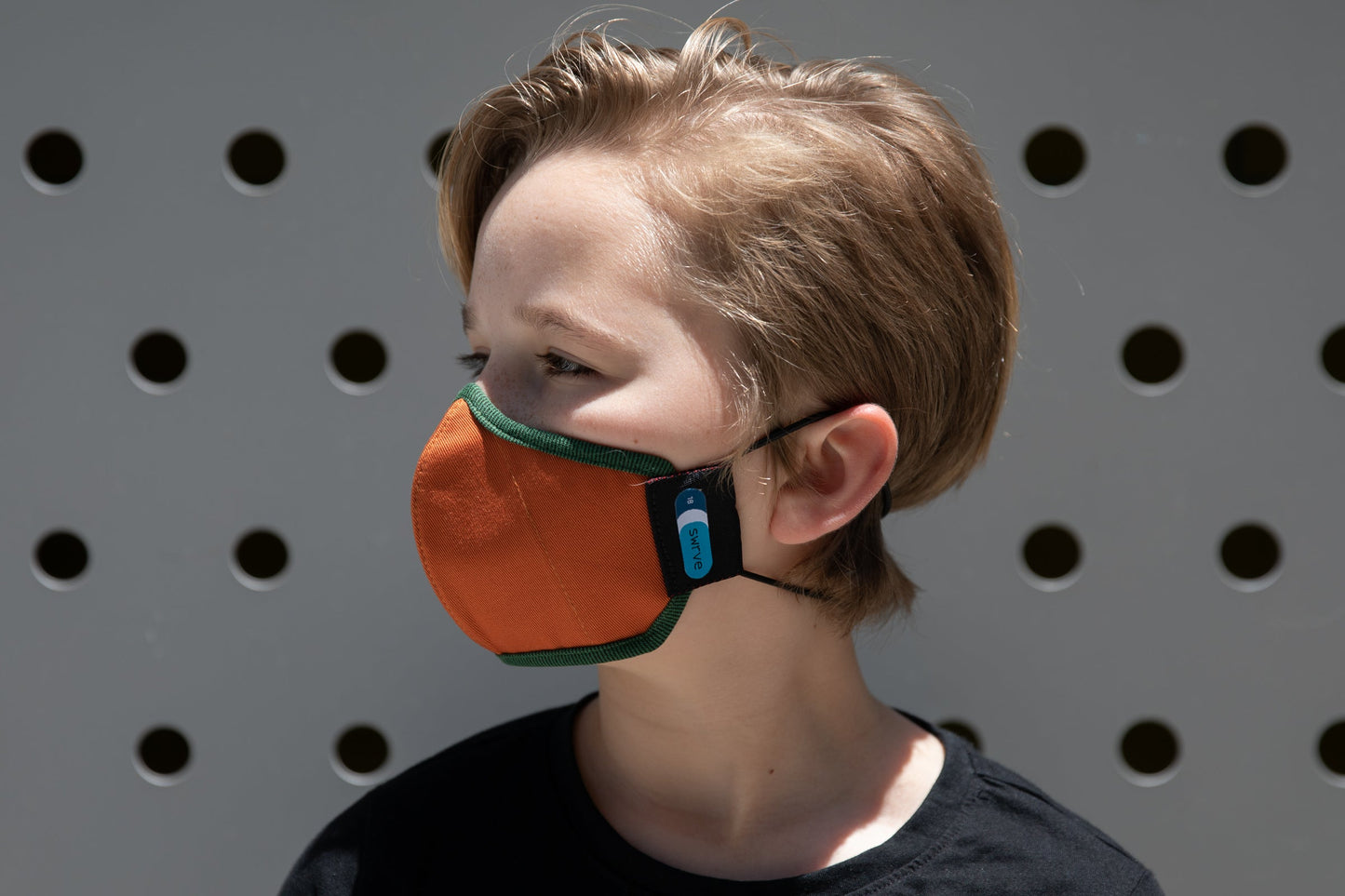 model wearing abby's kids summer cotton mask in spiral