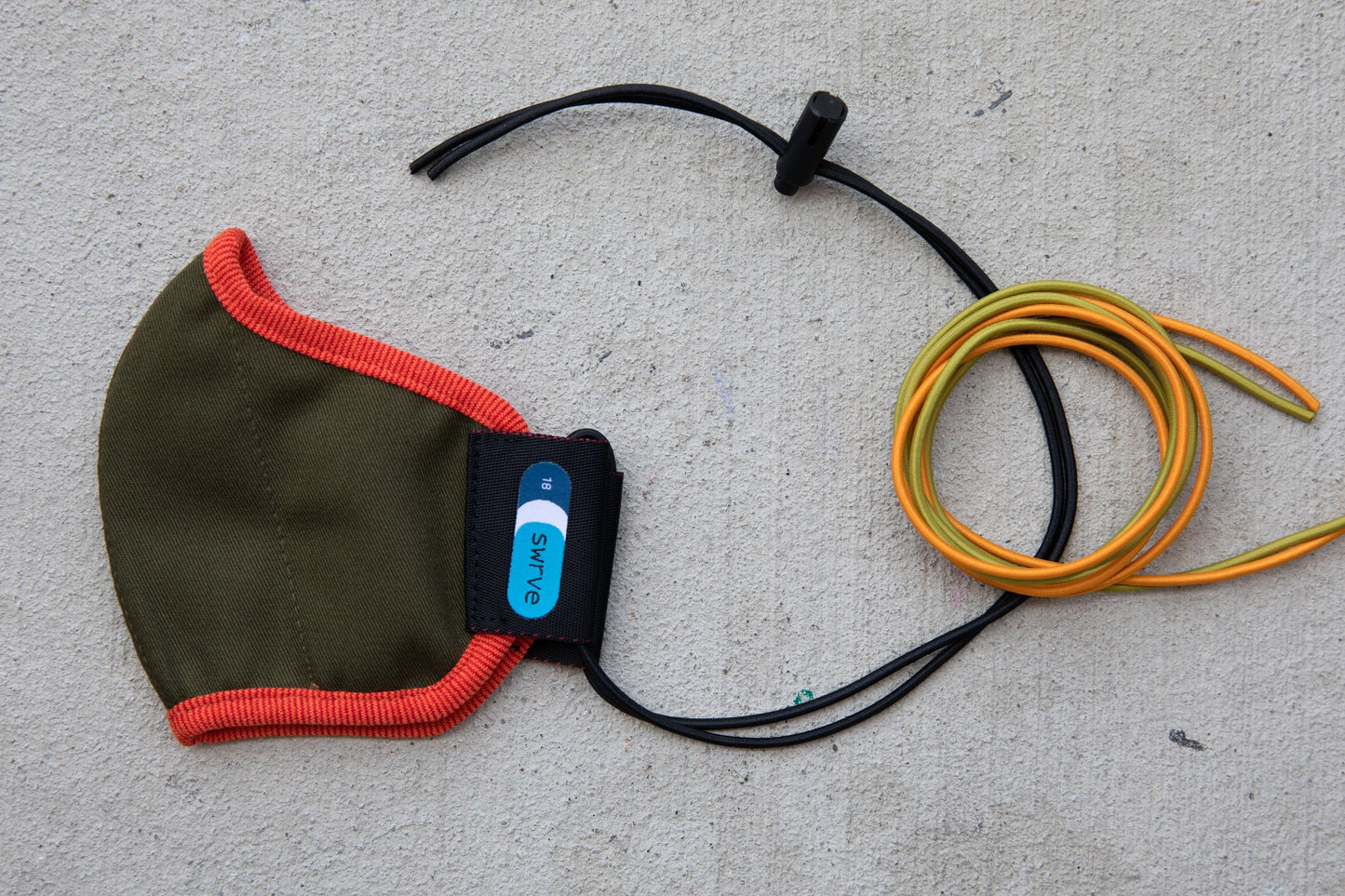 flat shot of the abby's kids summer cotton mask in peach