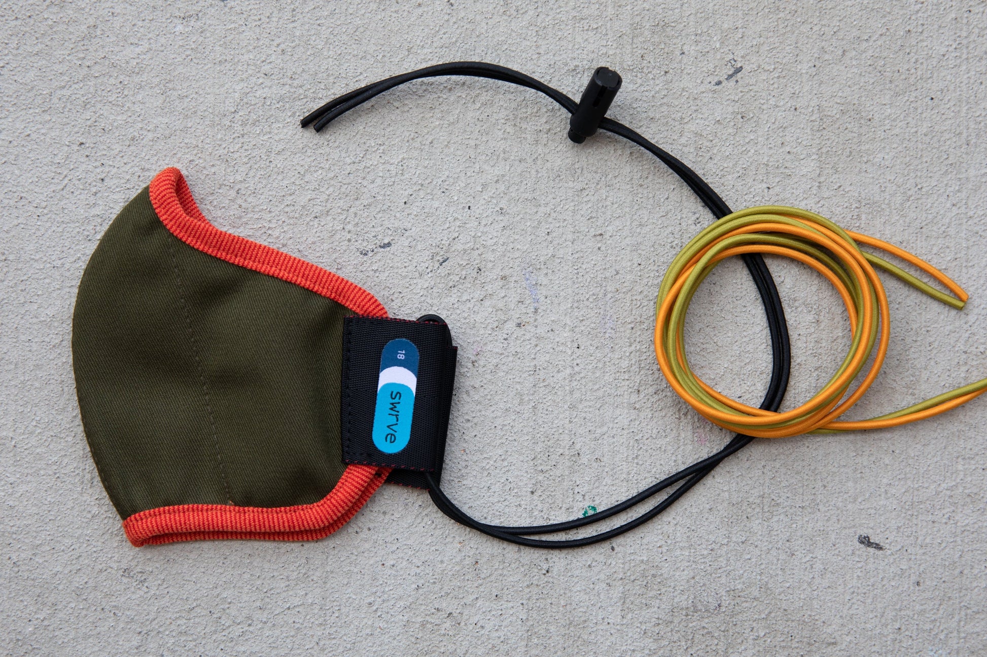 flat shot of the abby's kids summer cotton mask in peach