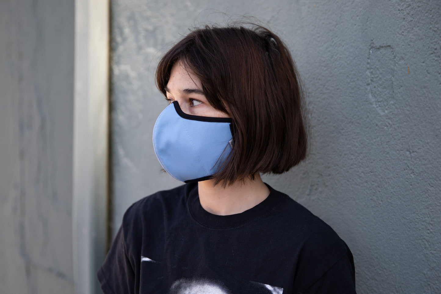 roxy wearing the organic summer cotton mask in robin's egg blue