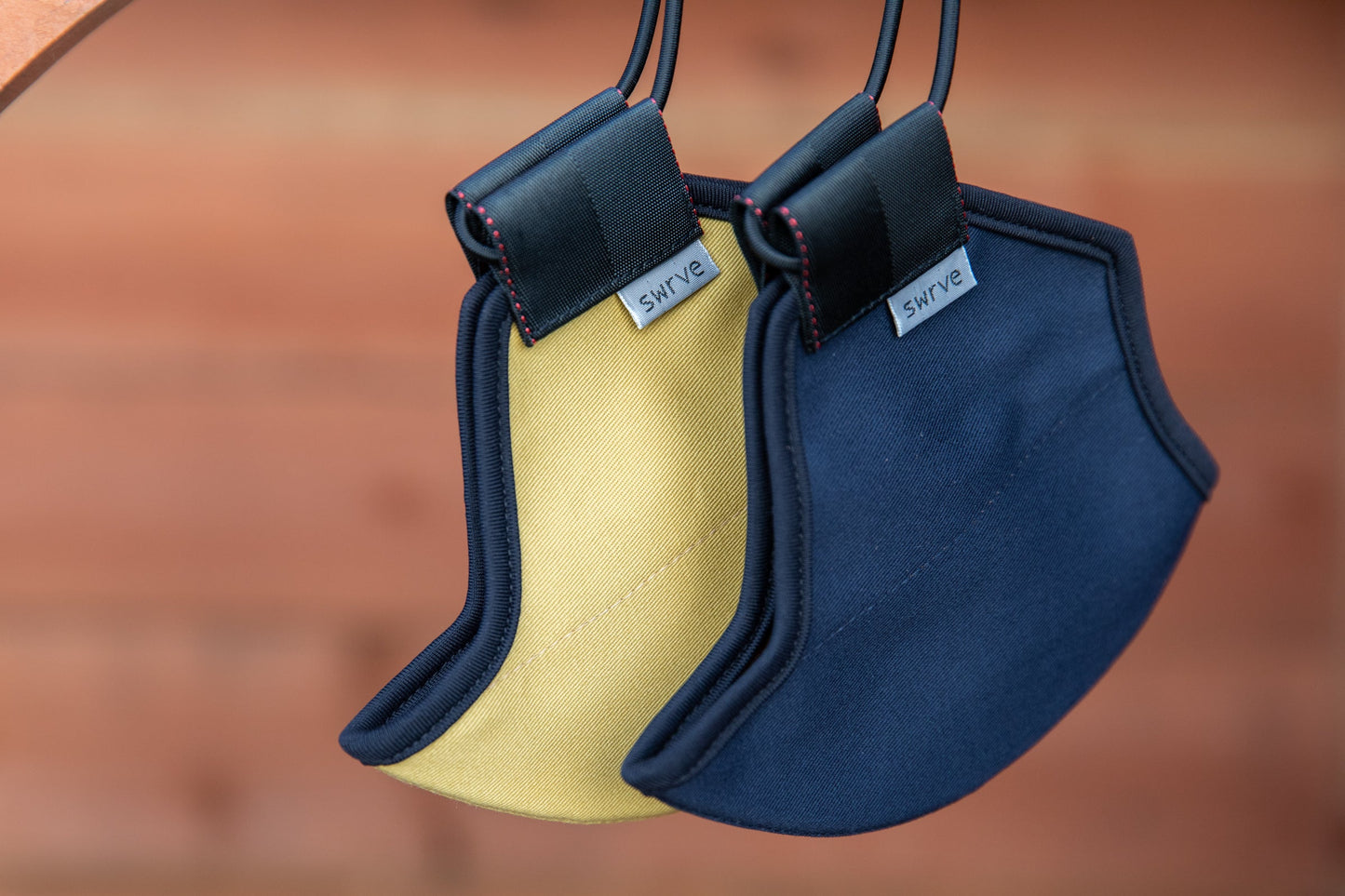 flat shot of the organic summer cotton masks in honey and navy blue