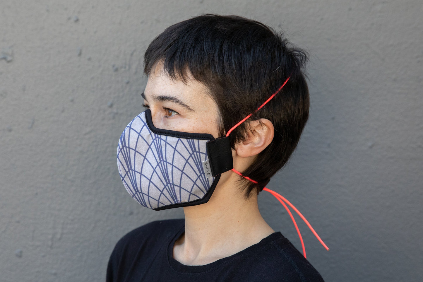 roxy wearing the art deco cotton mask in empire