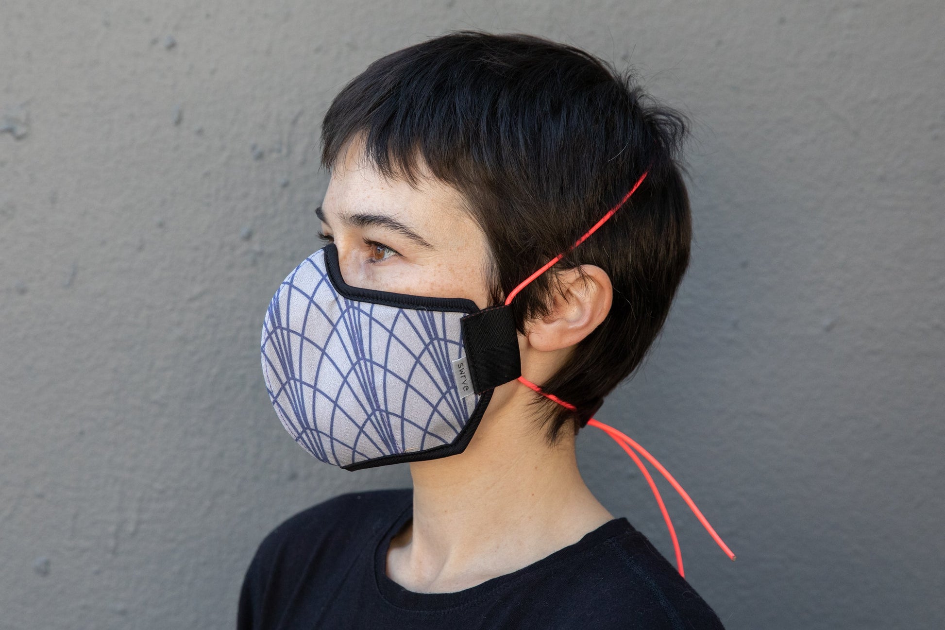 roxy wearing the art deco cotton mask in empire