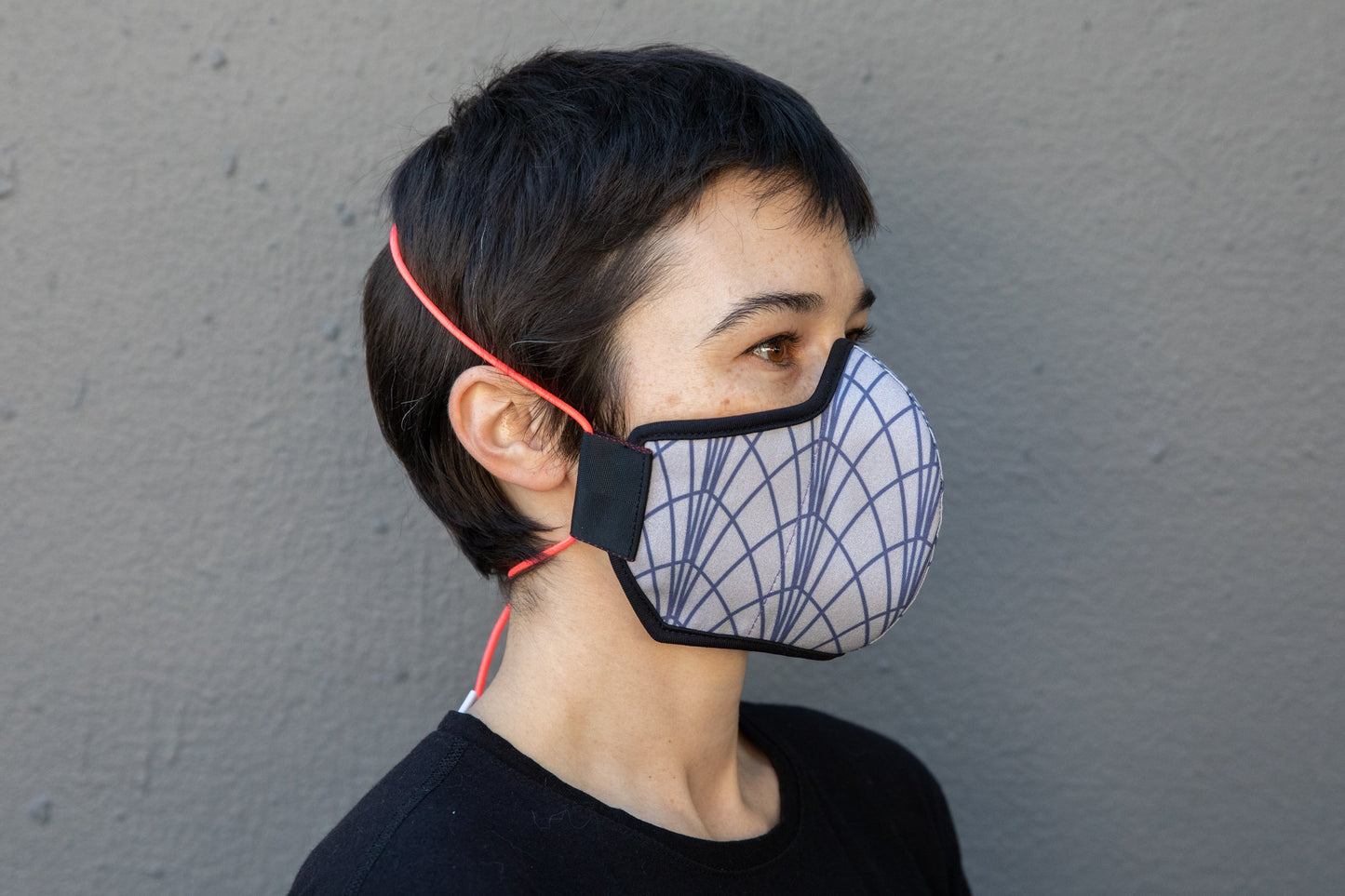 roxy wearing the art deco cotton mask in empire