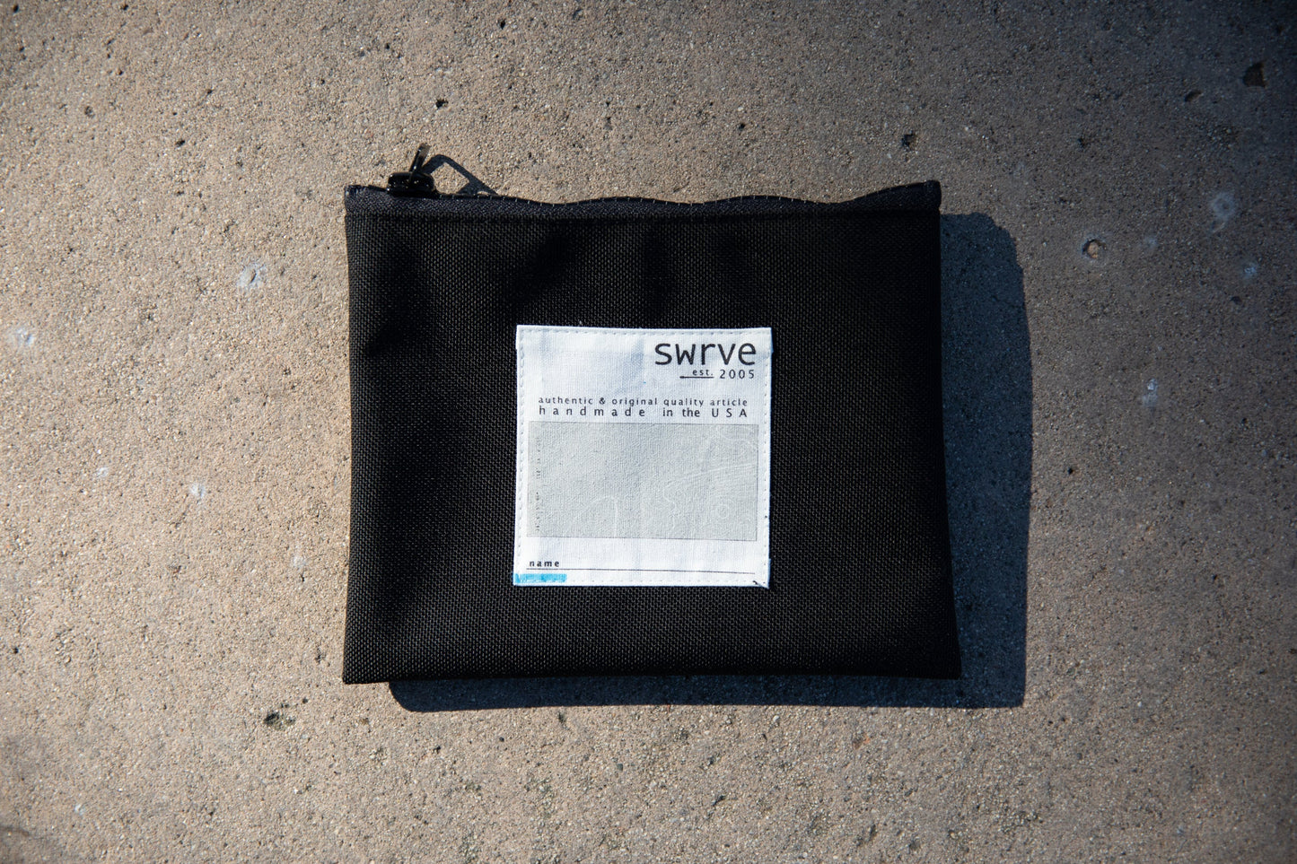 BLACK CORDURA TRAVEL POUCH