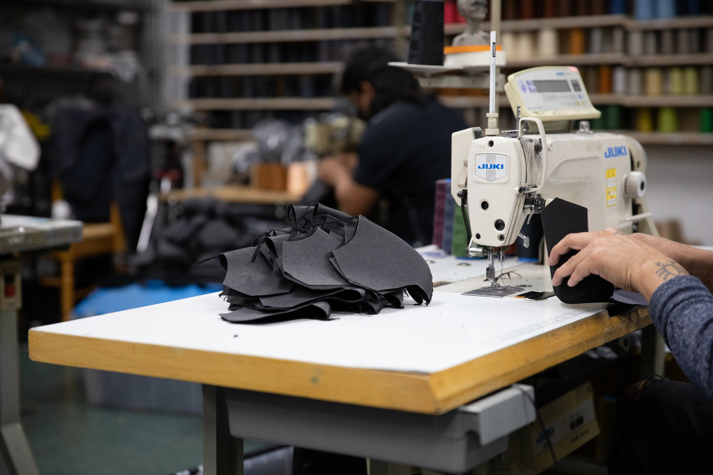 4 layer cotton masks being sewn