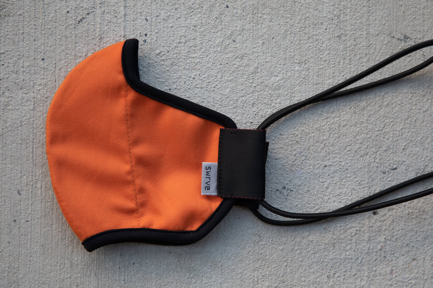 flat shot of the mid-summer cotton mask in sunset orange