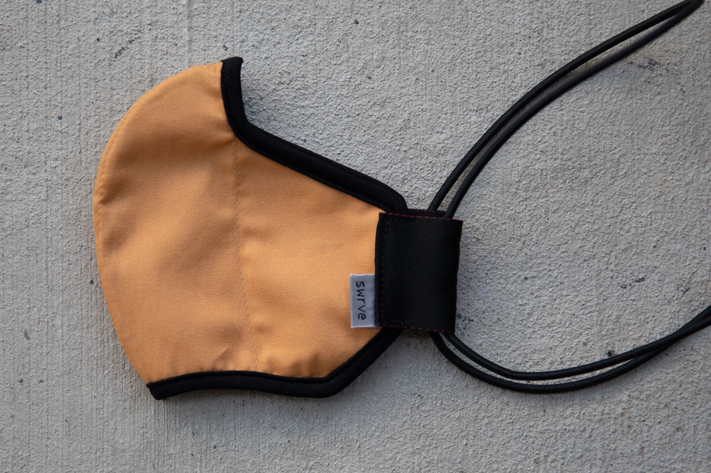 flat shot of the mid-summer cotton mask in golden hour