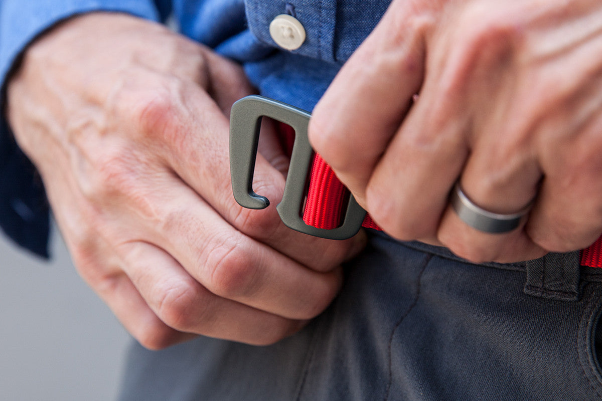 Matt is showing how the buckle latch works on the howlin red belt. 