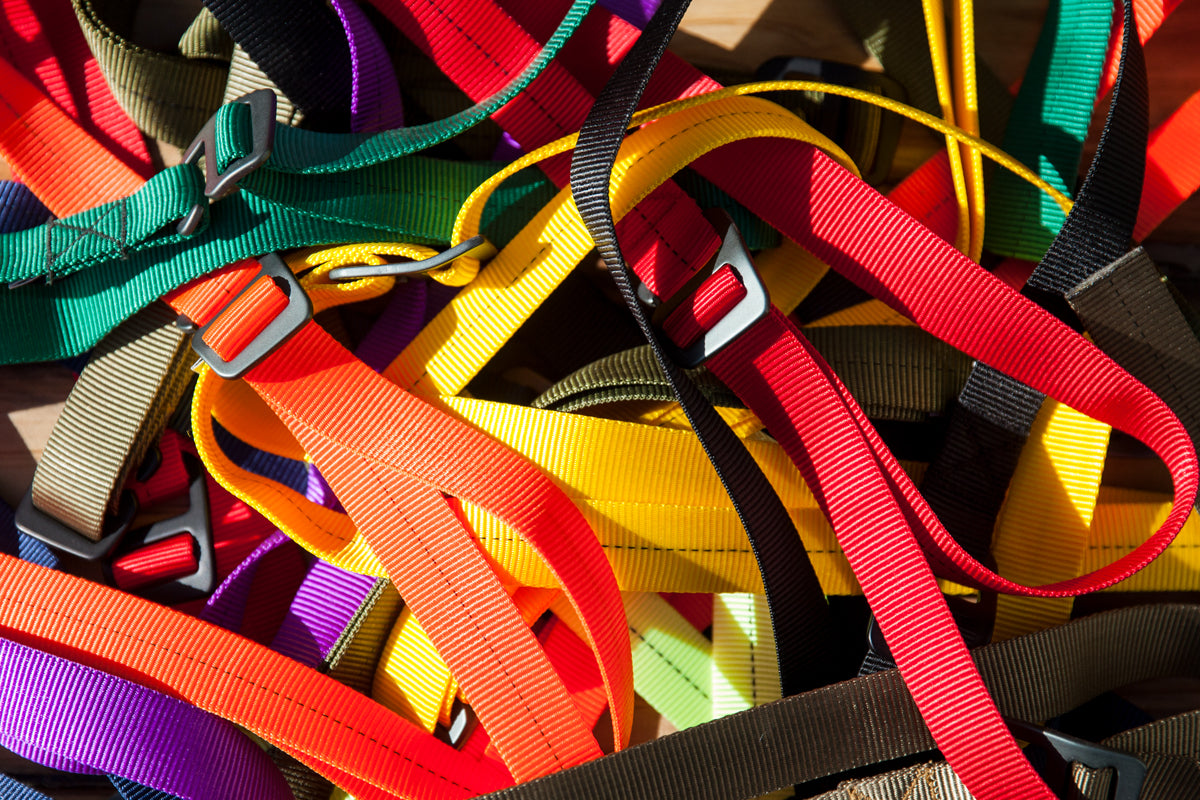 an assortment of 1" belts. 