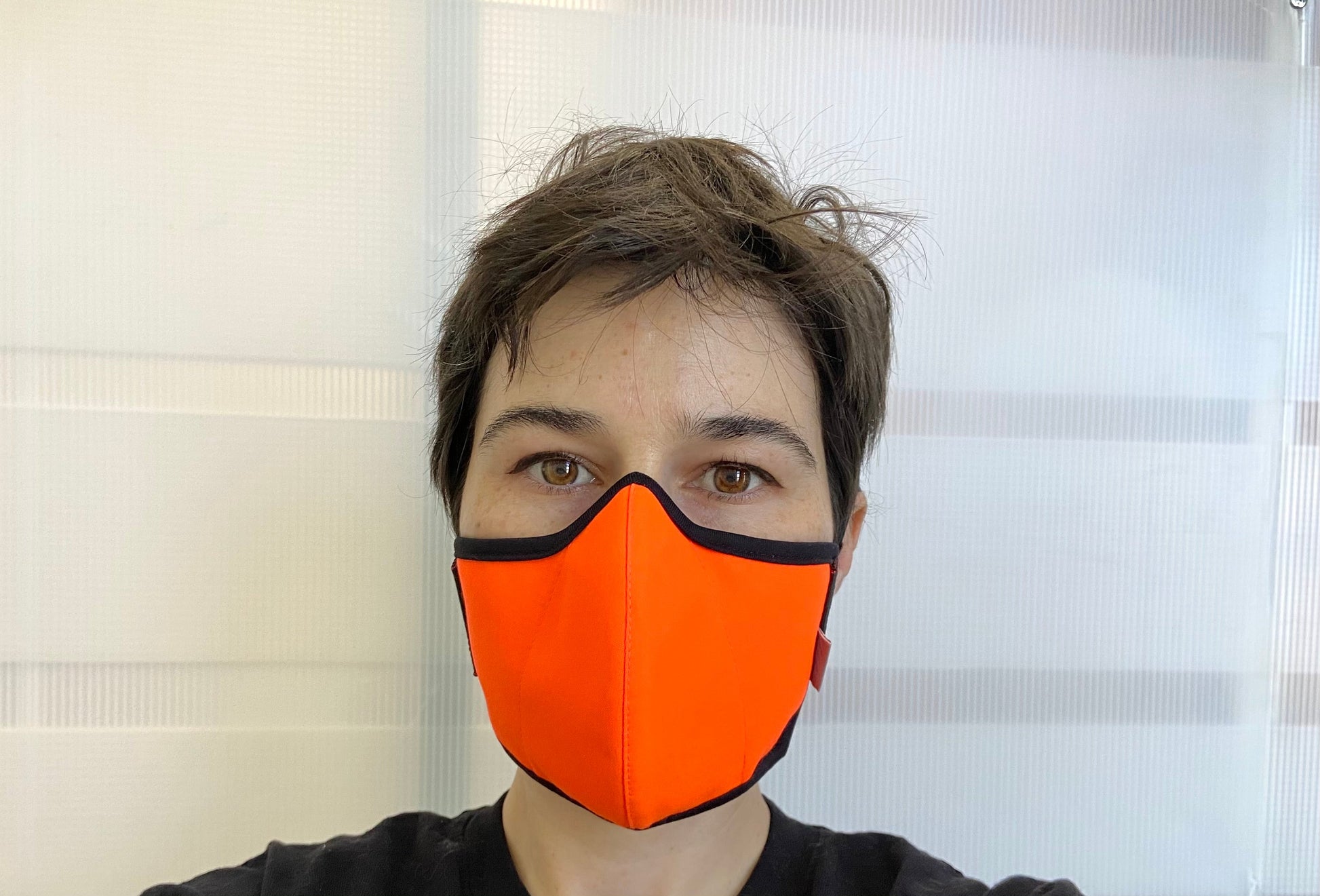 roxy is wearing the fluorescent orange mask.