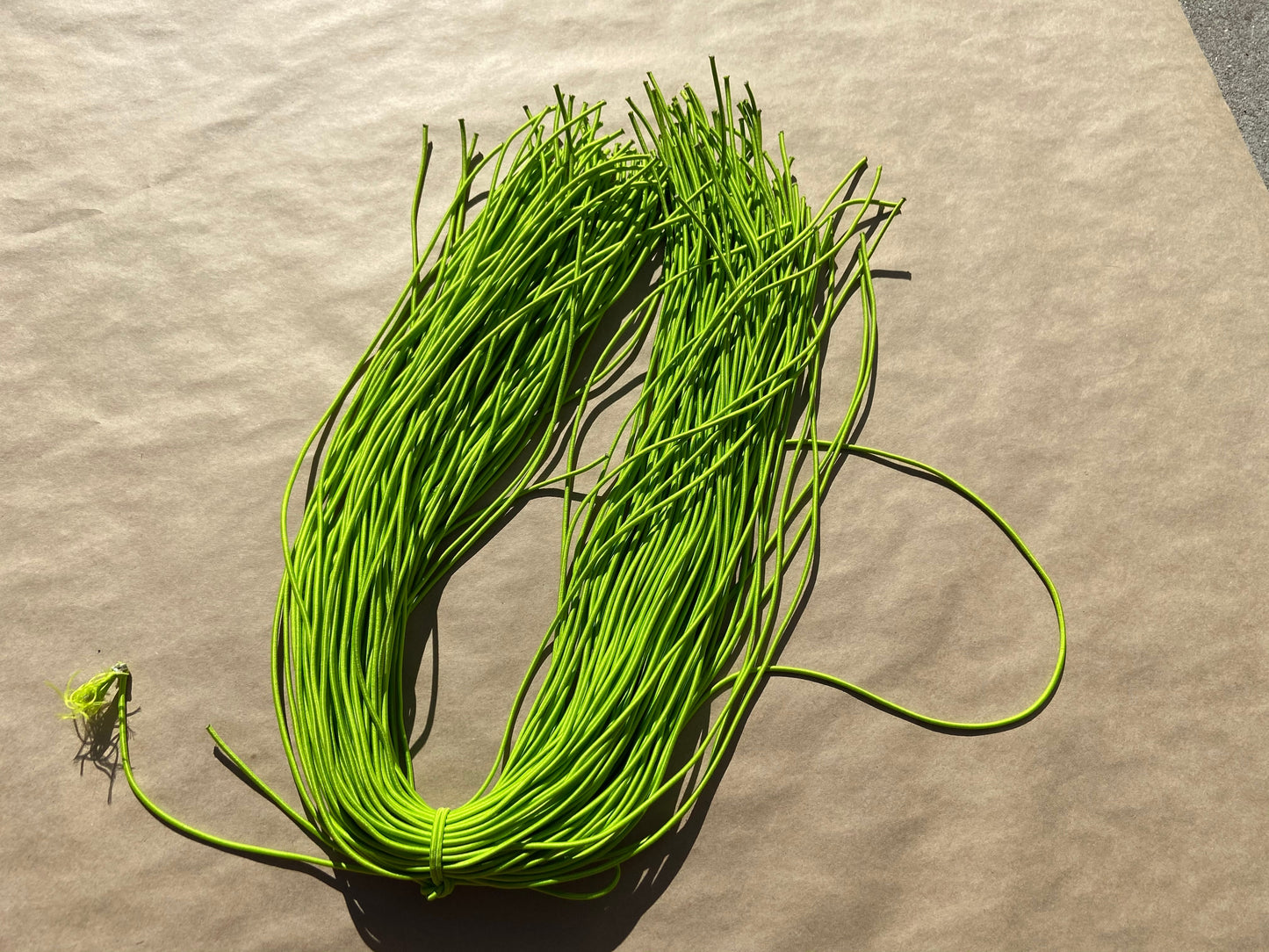 flat shot of our mask color cord in lime