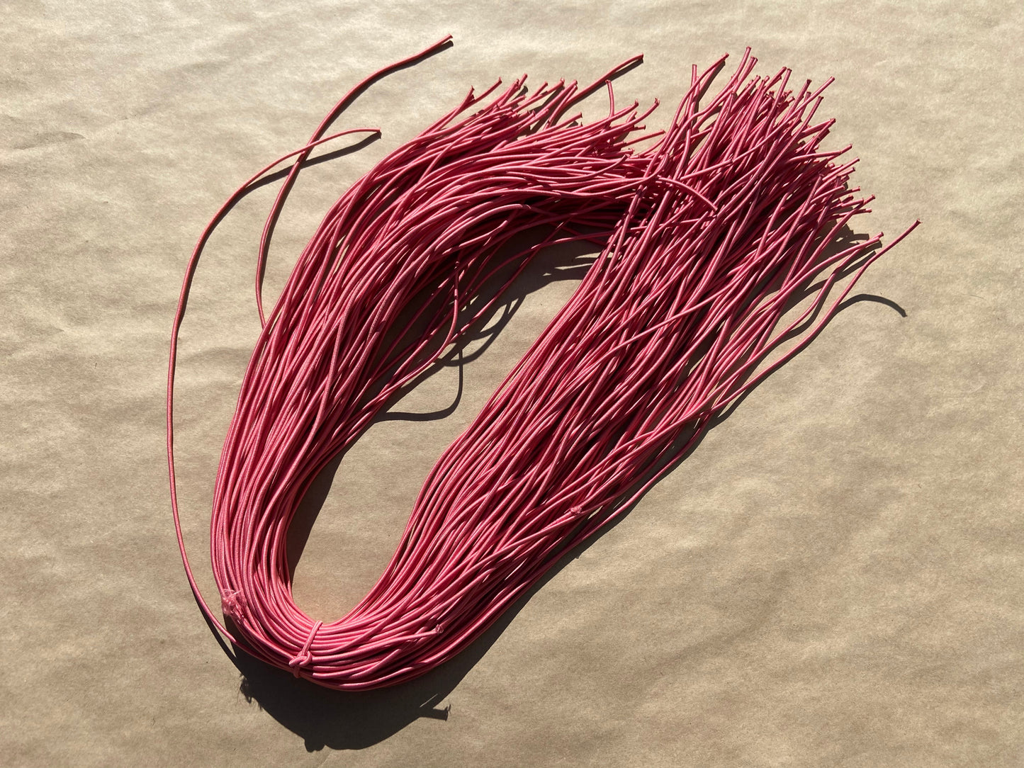flat shot of our mask color cord in dusty rose