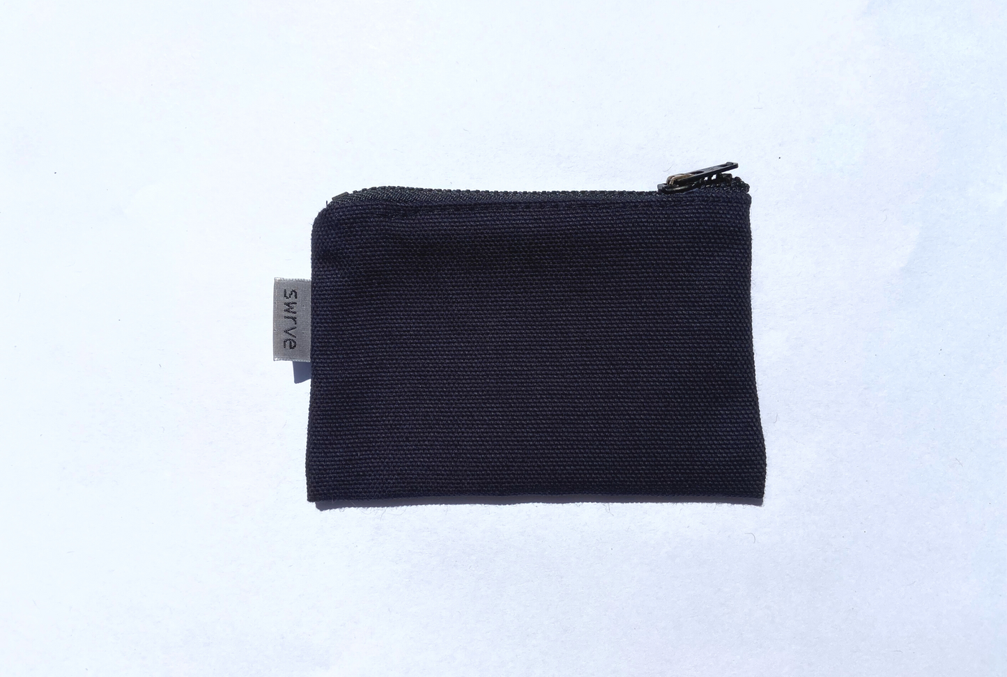 navy bolsita with gunmetal ykk zipper